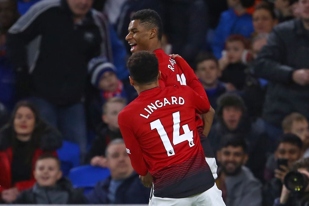 Manchester United's English striker Marcus Rashford celebrates with Manchester United's English midfielder Jesse Lingard after scoring the opening ...