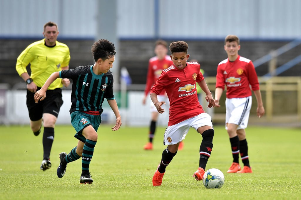 COLERAINE, NORTHERN IRELAND - JULY 26: Shola Shoretire (R) of Manchester United and Mikey Saunders (L) of Southampton during the Super Cup NI tournament group game between Manchester United u16's and Southampton u16's at the Showgrounds on July 26, 2017 in Coleraine, Northern Ireland. 