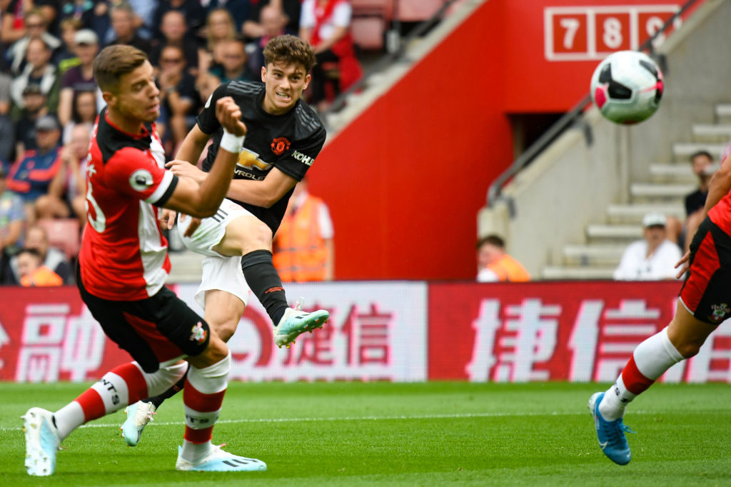 Daniel James of Manchester United scores their first goal during the Premier League match between Southampton FC and Manchester United at St Mary's...