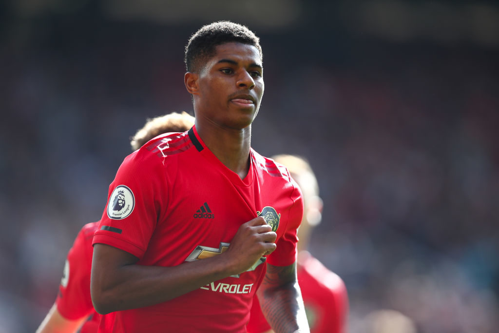 MANCHESTER, ENGLAND - SEPTEMBER 14: Marcus Rashford of Manchester United celebrates after scoring a goal to make it 1-0 during the Premier League match between Manchester United and Leicester City at Old Trafford on September 14, 2019 in Manchester, United Kingdom. 