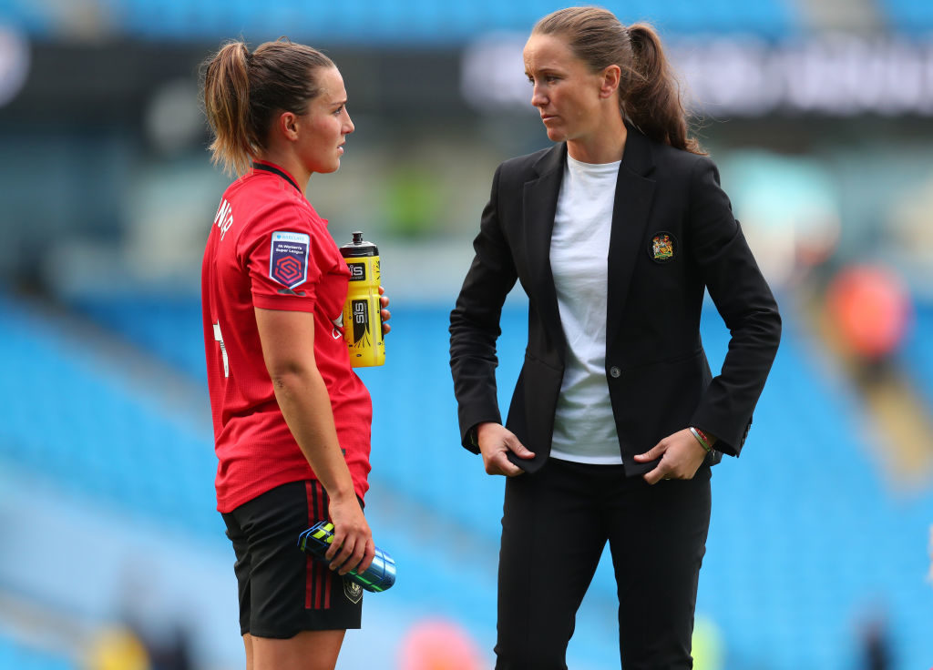 MANCHESTER, ENGLAND - SEPTEMBER 07: Casey Stoney manager of Manchester United speaks with Amy Turner of Manchester United after the Barclays FA Women's Super League match between Manchester City and Manchester United at Etihad Stadium on September 07, 2019 in Manchester, United Kingdom.