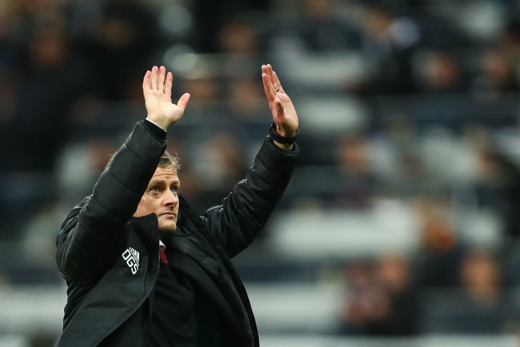 NEWCASTLE UPON TYNE, ENGLAND - OCTOBER 06: Ole Gunnar Solskjaer the head coach / manager of Manchester United waves to the fans at full time during the Premier League match between Newcastle United and Manchester United at St. James Park on October 6, 2019 in Newcastle upon Tyne, United Kingdom. 