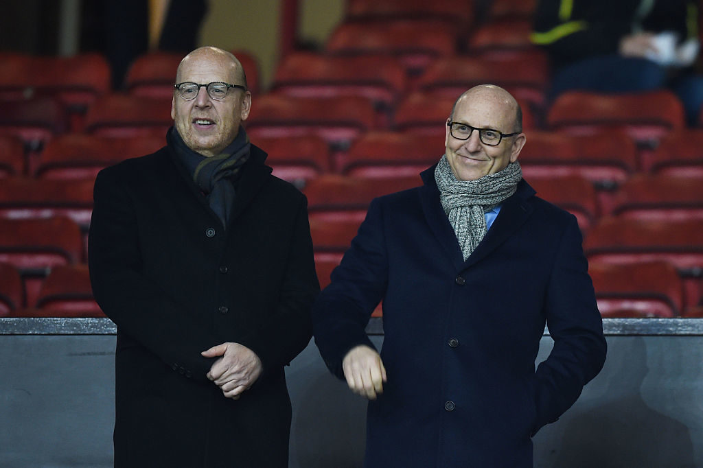 MANCHESTER, ENGLAND - FEBRUARY 11: Avram Glazer (L) and Joel Glazer, the Co-Chairmen of Manchester United look on during the Barclays Premier League match between Manchester United and Burnley at Old Trafford on February 11, 2015 in Manchester, England.  
