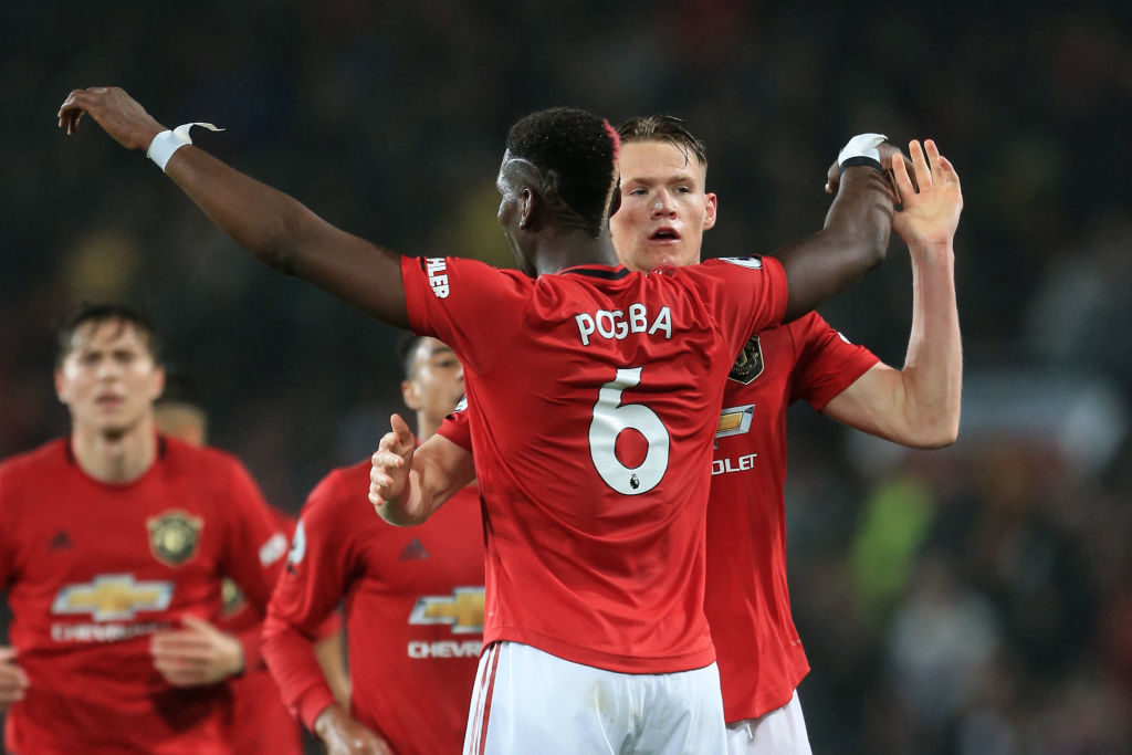 Scott McTominay of Man Utd celebrates scoring the opening goal with Paul Pogba during the Premier League match between Manchester United and Arsena...