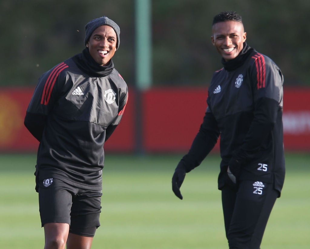 Ashley Young and Antonio Valencia of Manchester United in action during a training session at Aon Training Complex on October 30, 2017 in Mancheste...