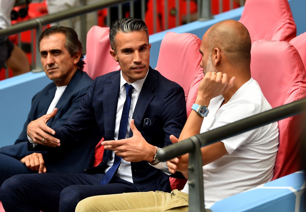 (THE SUN OUT, THE SUN ON SUNDAY OUT) Robin van Persie meets Pep Guardiola of  Man city beforte the FA Community Shield match between Liverpool and ...