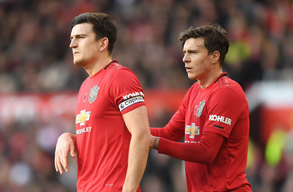 Harry Maguire and Victor Lindelof of Manchester United look on during the Premier League match between Manchester United and Brighton & Hove Al...