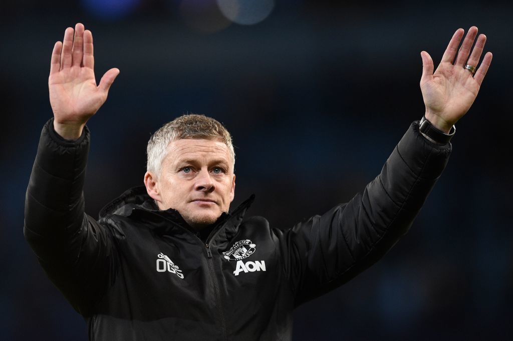 Manchester United's Norwegian manager Ole Gunnar Solskjaer applauds the fans following the English League Cup semi-final second leg football match between Manchester City and Manchester United at the Etihad Stadium in Manchester, north west England, on January 29, 2020. - Manchester City booked their place in a third successive League Cup final, but made hard work of disposing of Manchester United 3-2 on aggregate after losing the second leg of their semi-final 1-0 at home on Wednesday. (Photo by Oli SCARFF / AFP) / RESTRICTED TO EDITORIAL USE. No use with unauthorized audio, video, data, fixture lists, club/league logos or 'live' services. Online in-match use limited to 120 images. An additional 40 images may be used in extra time. No video emulation. Social media in-match use limited to 120 images. An additional 40 images may be used in extra time. No use in betting publications, games or single club/league/player publications. /  