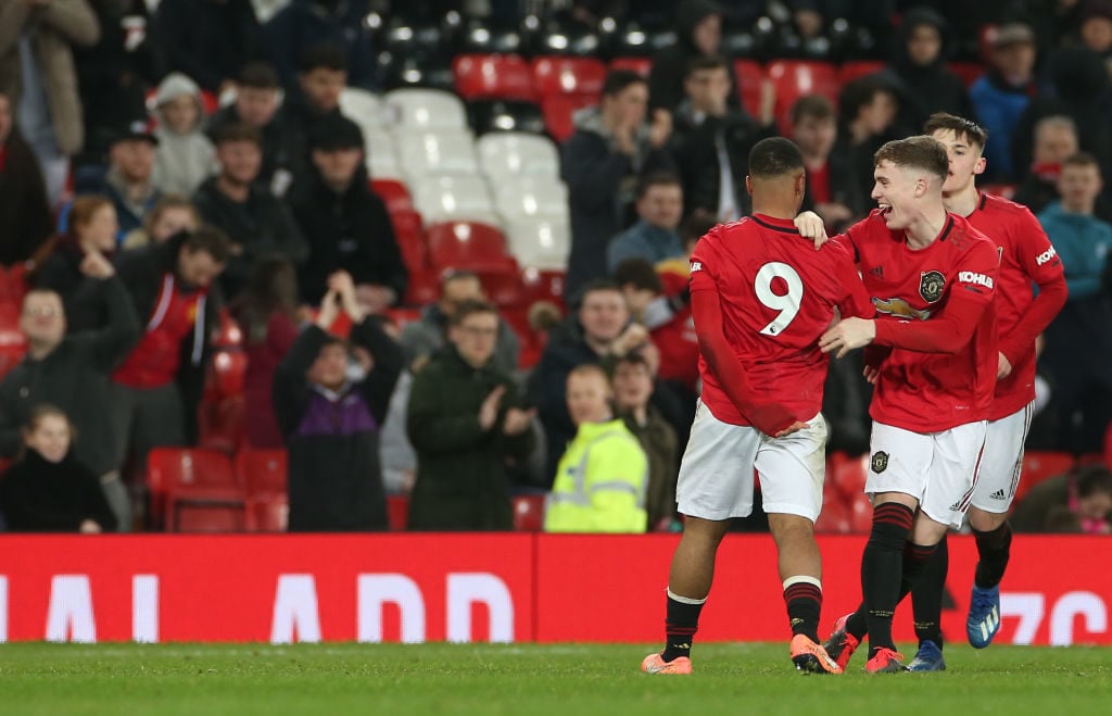MANCHESTER, ENGLAND - FEBRUARY 05: Dillon Hoogewerf of Manchester United U18s celebrates scoring their first goal during the FA Youth Cup FIfth Round match between Manchester United U18s and Leeds United U18s at Old Trafford on February 05, 2020 in Manchester, England.