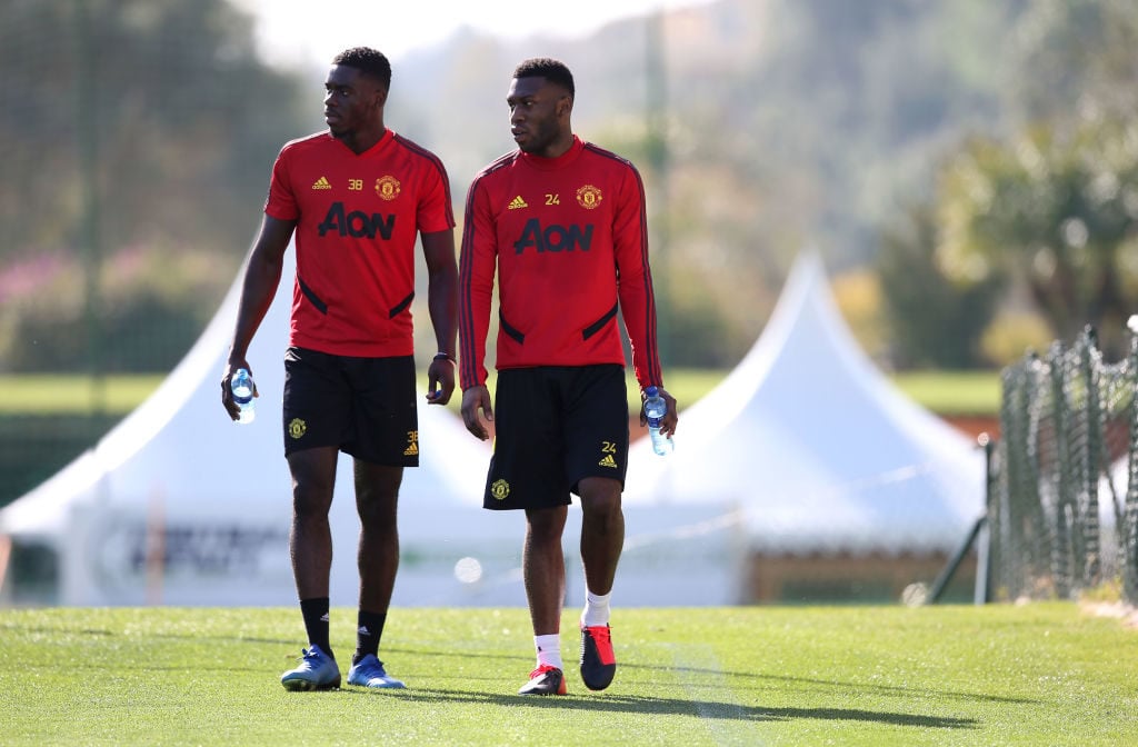 MALAGA, SPAIN - FEBRUARY 11: (EXCLUSIVE COVERAGE) Axel Tuanzebe and Timothy Fosu-Mensah of Manchester United in action during first team training session on February 11, 2020 in Malaga, Spain.