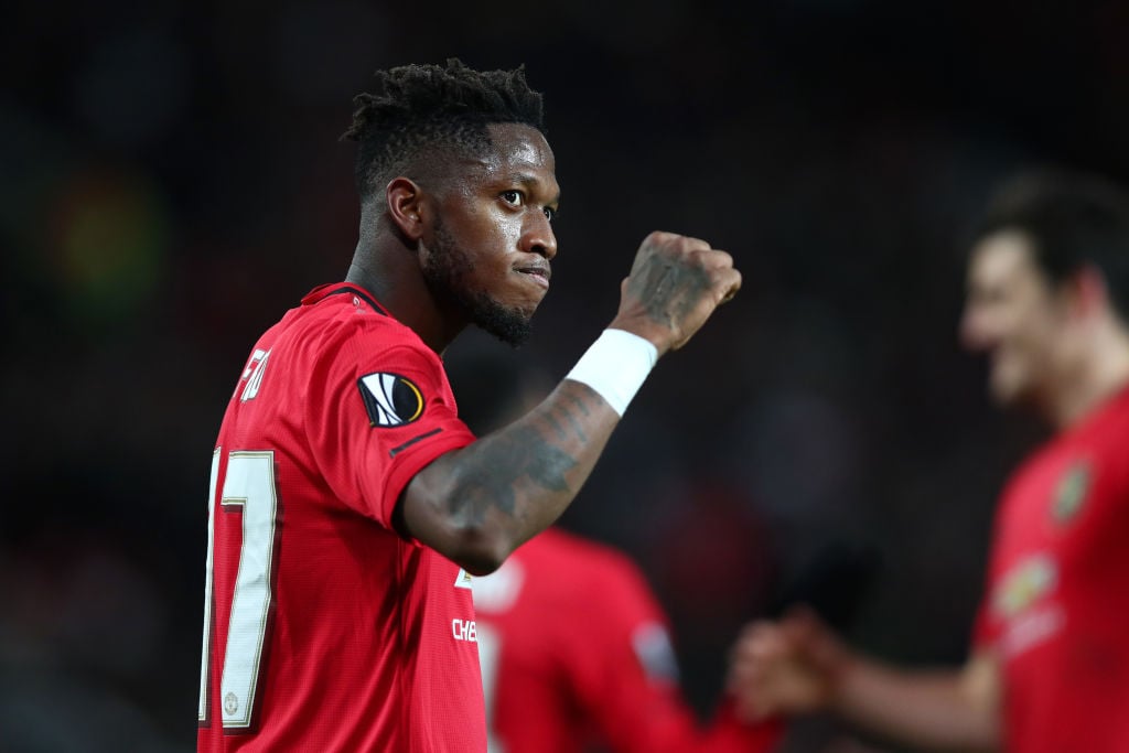 Fred of Manchester United celebrates after scoring his team's fourth goal during the UEFA Europa League round of 32 second leg match between Manche...