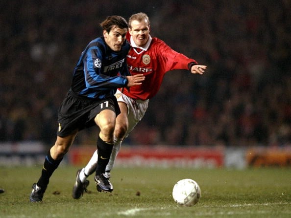 3 Mar 1999:  Nicola Ventola of Inter Milan gets away from Henning Berg of Manchester United during the UEFA Champions League quarter-final first leg match at Old Trafford in Manchester, England. United won 2-0. 