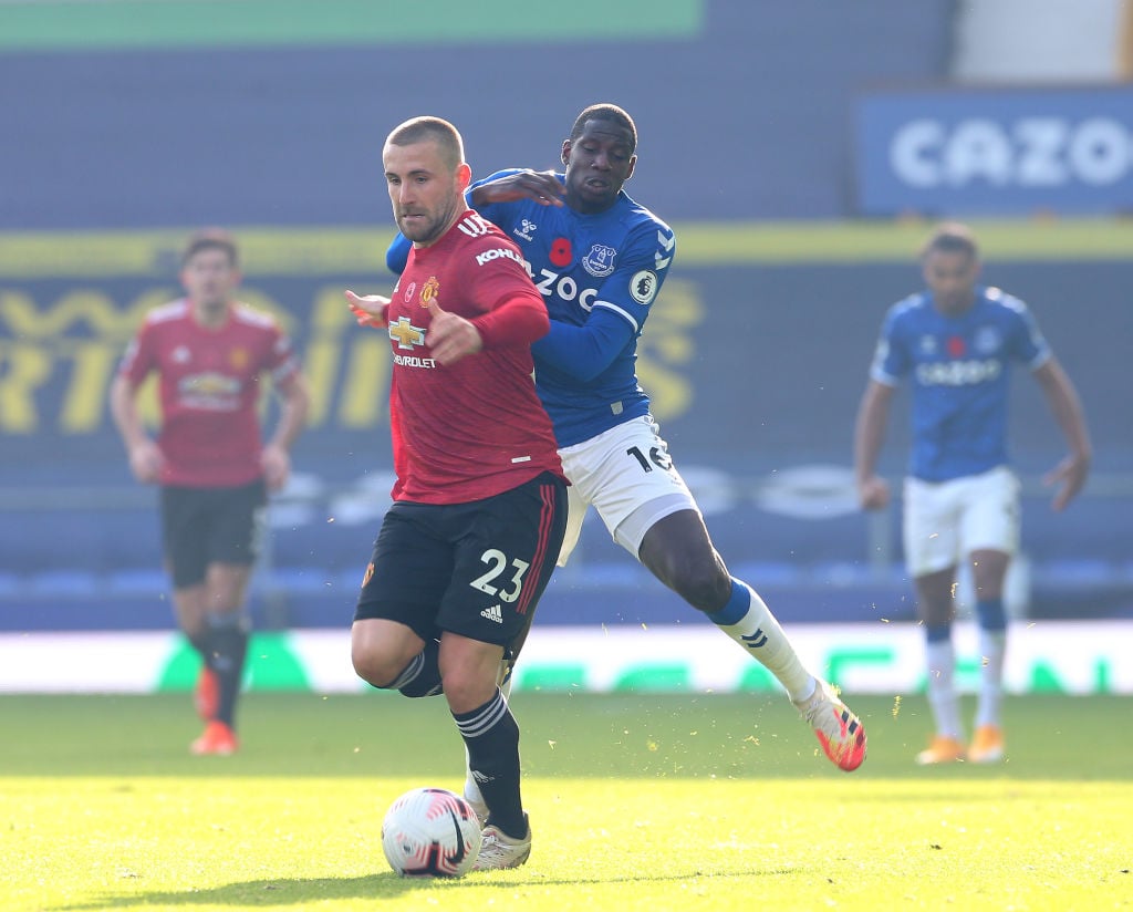 LIVERPOOL, ENGLAND - NOVEMBER 07: Luke Shaw of Manchester United in action with Abdoulaye Doucoure of Everton during the Premier League match between Everton and Manchester United at Goodison Park on November 07, 2020 in Liverpool, England. Ole Gunnar Solskjaer.