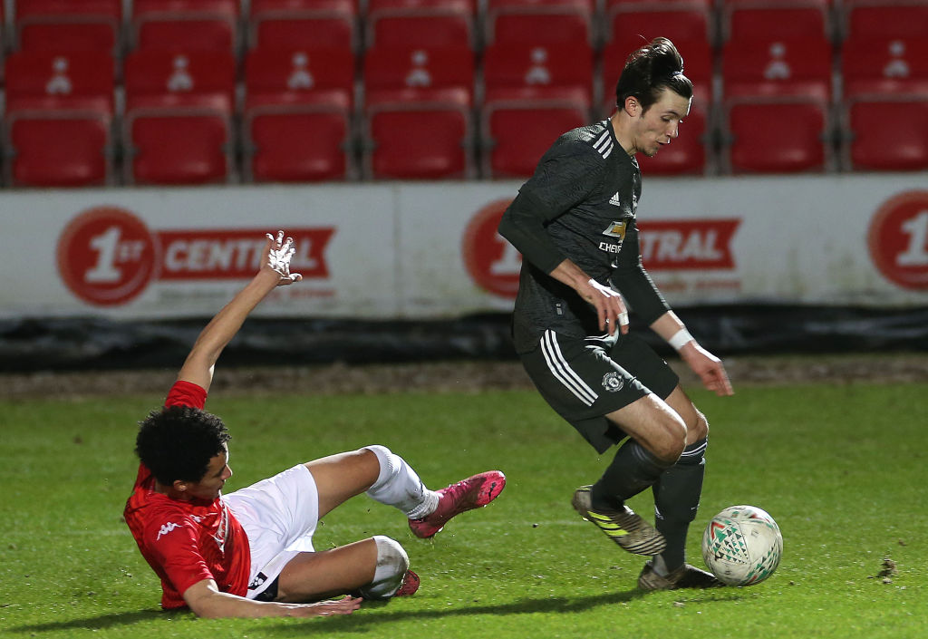 SALFORD, ENGLAND - MARCH 10: Charlie McNeill of Manchester United U18s in action during the FA Youth Cup match between Salford City U18s and Manchester United U18s at Peninsula Stadium on March 10, 2021 in Salford, England. 