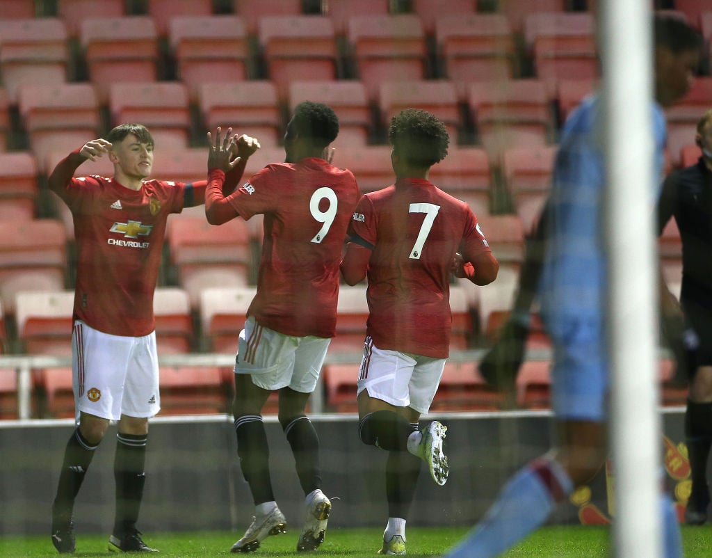 LEIGH, ENGLAND - APRIL 09: Mark Helm of Manchester United U23s celebrates scoring their first goal during the Premier League 2 match between Manchester United U23s and West Ham United U23s at Leigh Sports Village on April 09, 2021 in Leigh, England. 