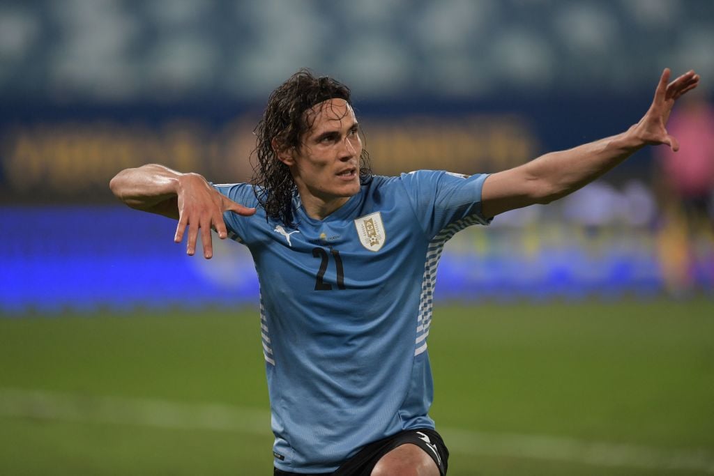 Edinson Cavani trains as goalkeeper for Uruguay