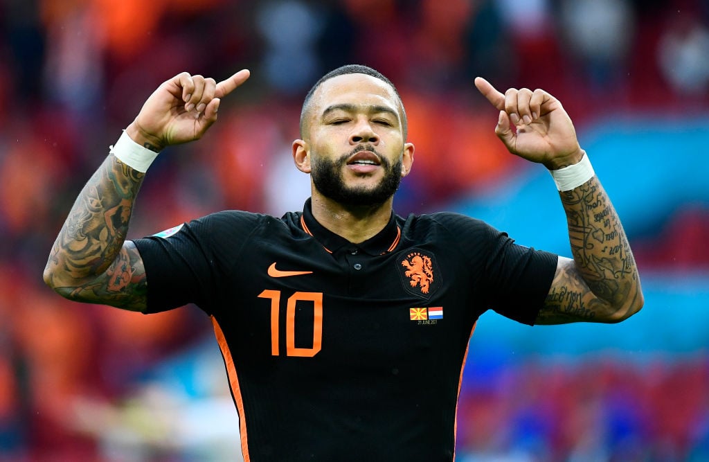 Memphis Depay of Netherlands celebrates after scoring their side's first goal during the UEFA Euro 2020 Championship Group C match between North Ma...