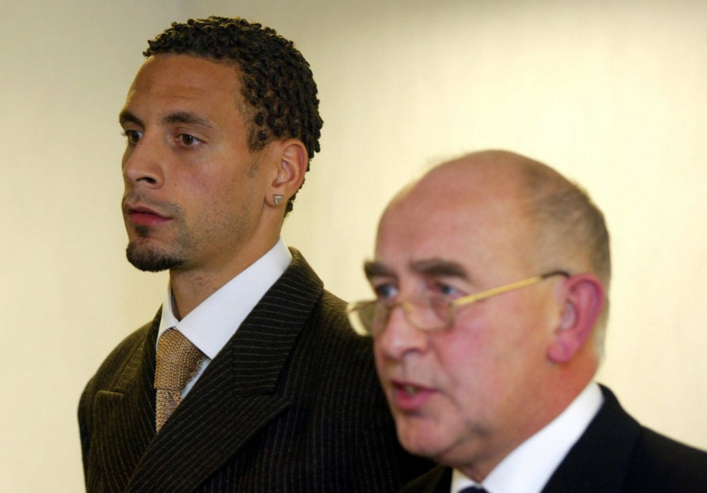 Manchester United's Rio Ferdinand (L) st
