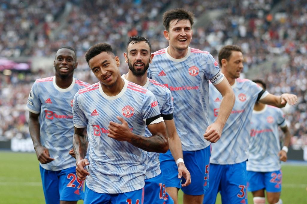 Manchester United's English midfielder Jesse Lingard (2nd L) celebrates with teammates after scoring their second goal during the English Premier L...