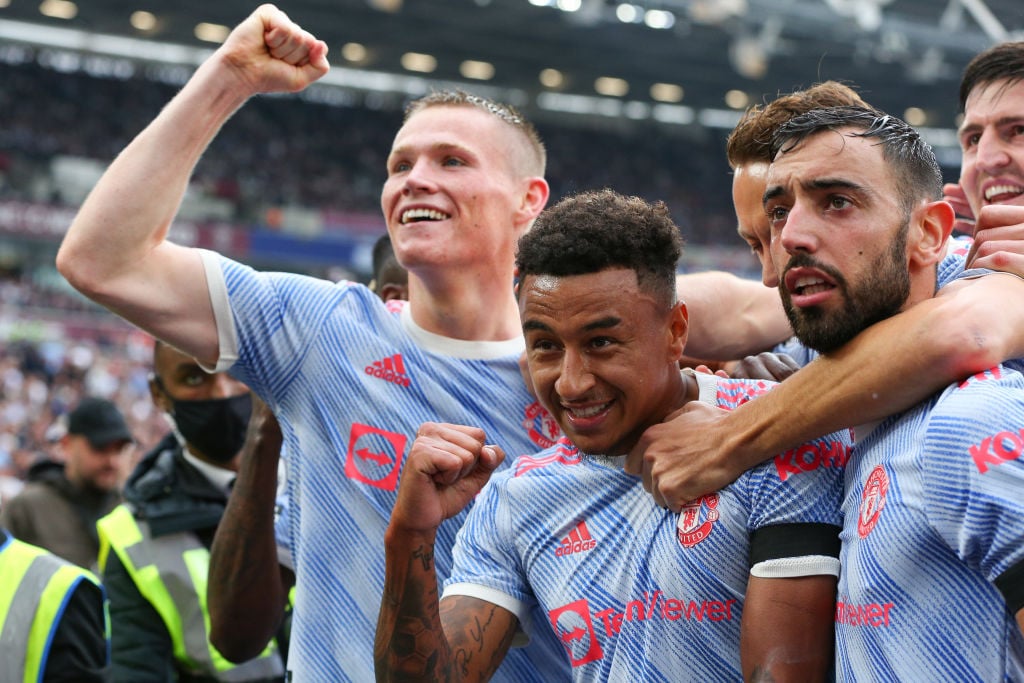 Jesse Lingard of Manchester United celebrates scoring his side's second goal with team mates during the Premier League match between West Ham Unite...