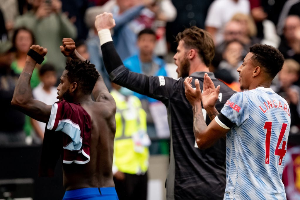 Jesse Lingard, Fred and David de Gea of Manchester United celebrate at the end of the Premier League match between West Ham United and Manchester U...