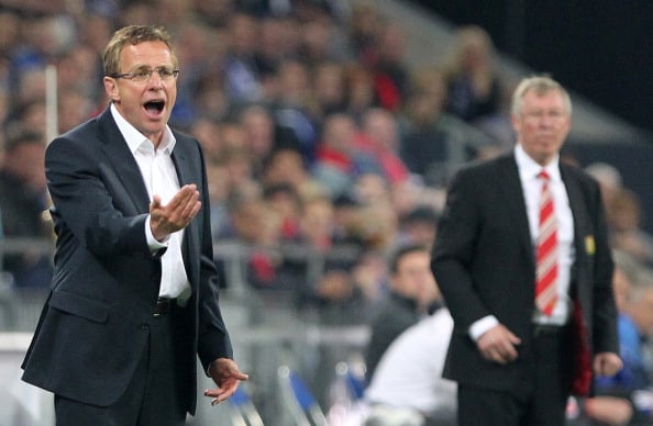Schalke's head coach Ralf Rangnick (L) g