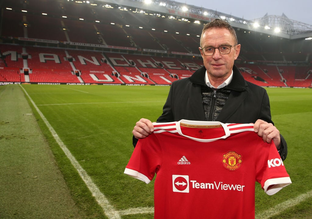 Manchester United release official pictures of Rangnick posing with the shirt at Old Trafford