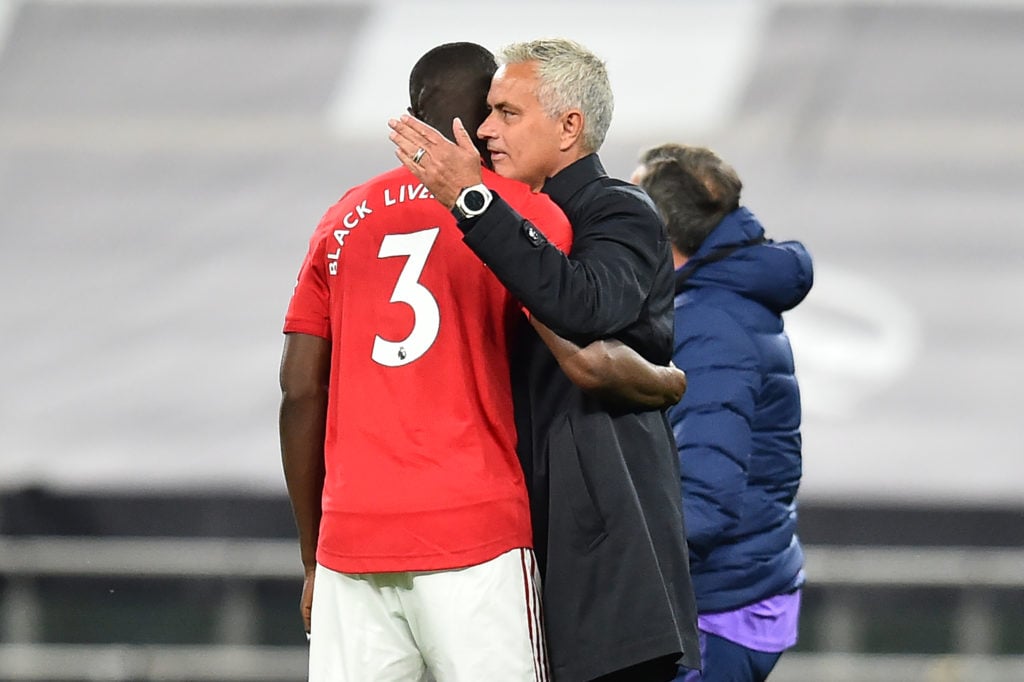 Jose Mourinho embraces Manchester United defender Eric Bailly.