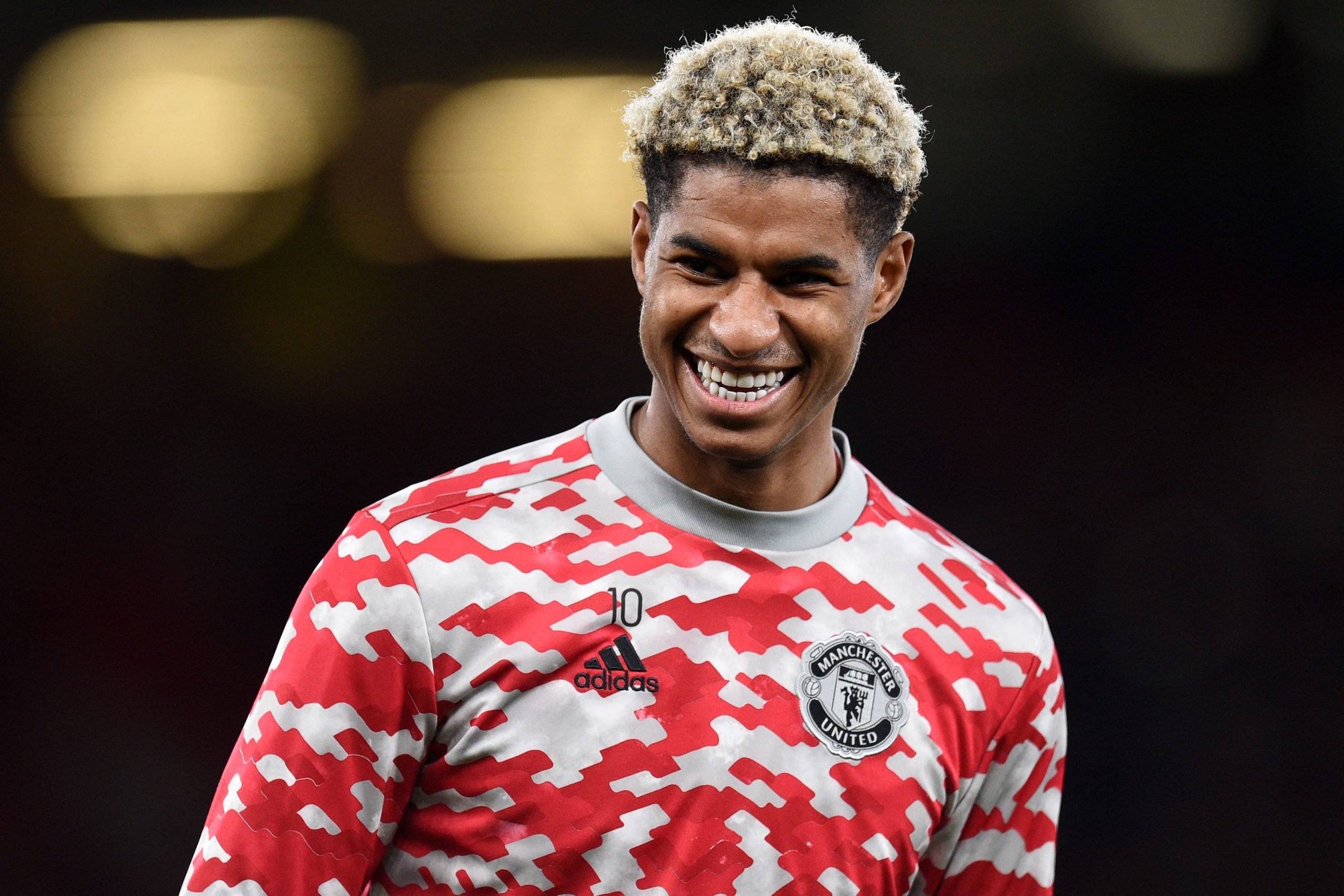 Marcus Rashford wants everybody to know he is happy after training pictures message