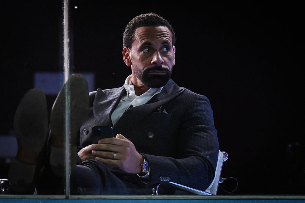 British former football player Rio Ferdinand waits for the start of the English Premier League football match between Aston Villa and Leeds at Vill...