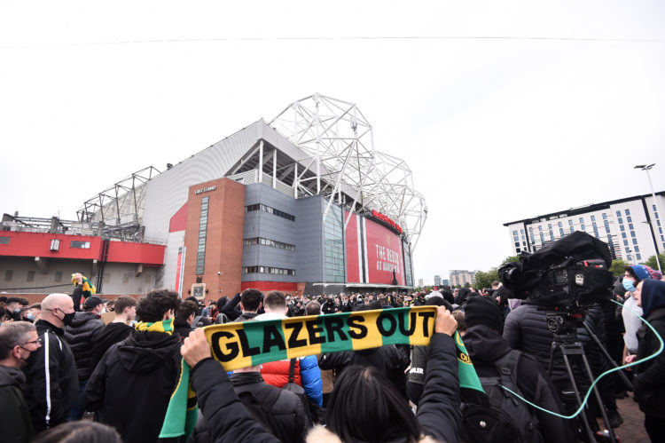 Manchester United fans place Glazers Out sign at the top of Mount Kilimanjaro