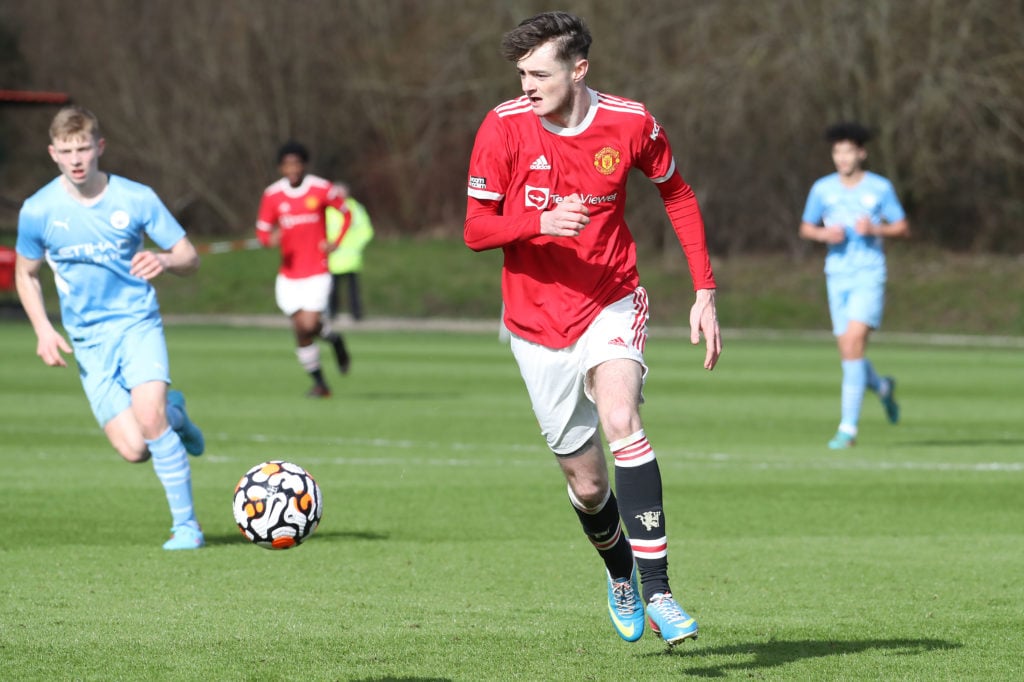 Joe Hugill of Manchester United U18s in action during the U18 Premier League match between Manchester United U18s and Manchester City U18s at Carri...