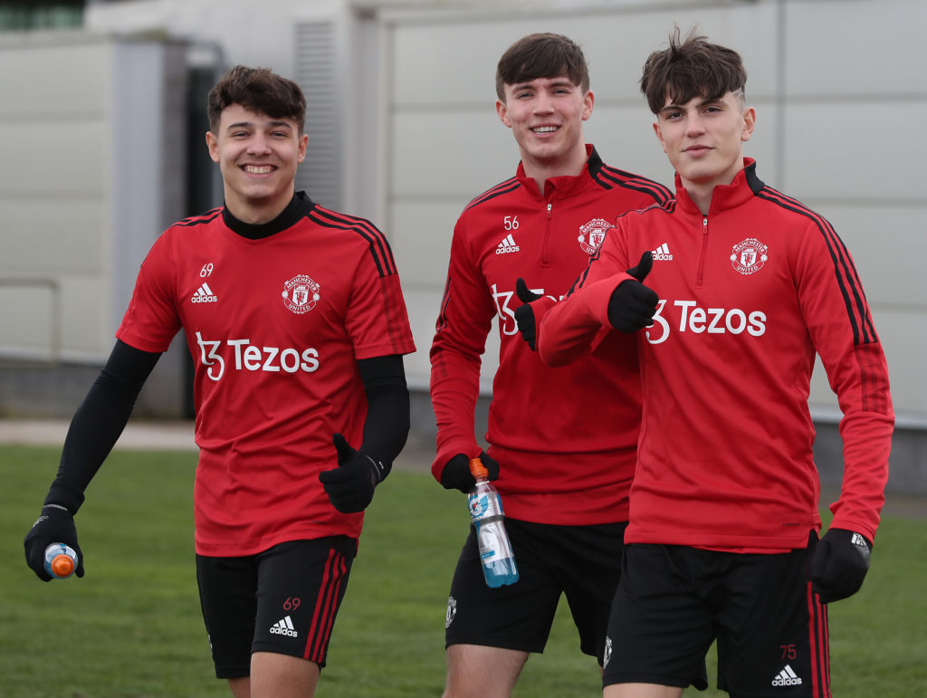 (EXCLUSIVE COVERAGE) Marc Jurado, Charlie McNeill, Alejandro Garnacho of Manchester United U18s in action during a training session at Carrington T...