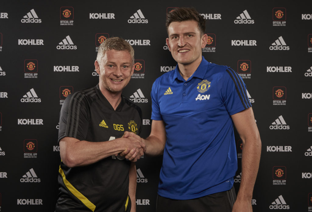 Manchester United Unveil New Signing Harry Maguire, pictured with Ole Gunnar Solskjaer