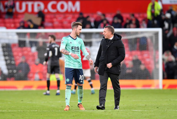 James Maddison of Leicester City with Leicester City Manager Brendan Rodgers at the end of the Premier League match between Manchester United and L...