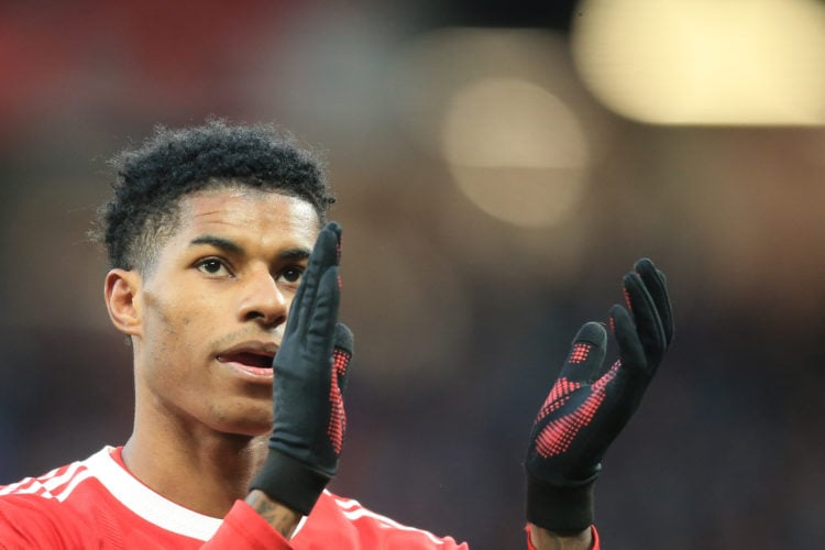 Manchester United's English striker Marcus Rashford applauds at the end of the English Premier League football match between Manchester United and ...