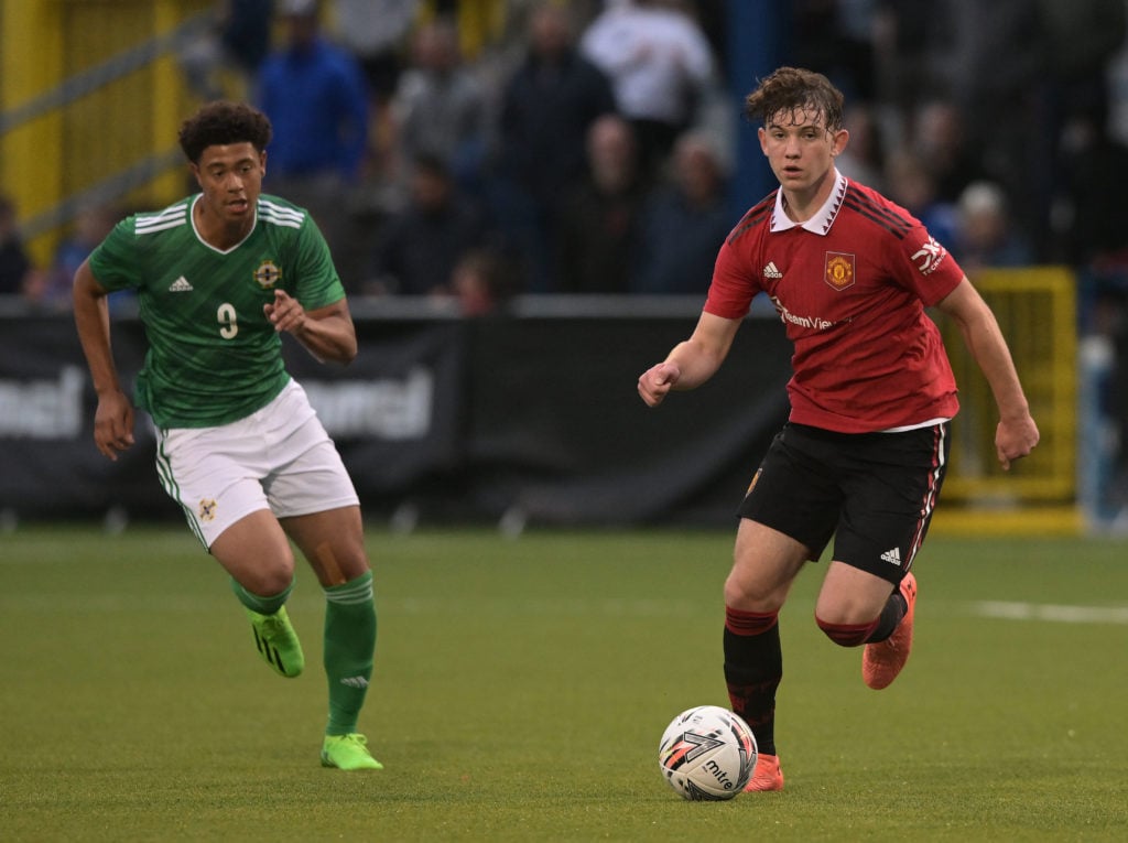 Louis Jackson of Manchester United and Reece Evans of Northern Ireland during the NI Super Cup match between Northern Ireland and Manchester United...