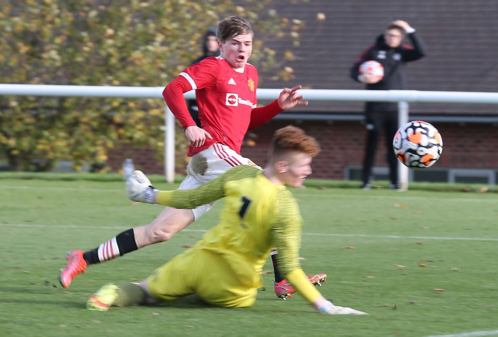 Ethan Ennis of Manchester United U18s scores their second goal during the U18 Premier League match between Derby County U18s and Manchester United ...