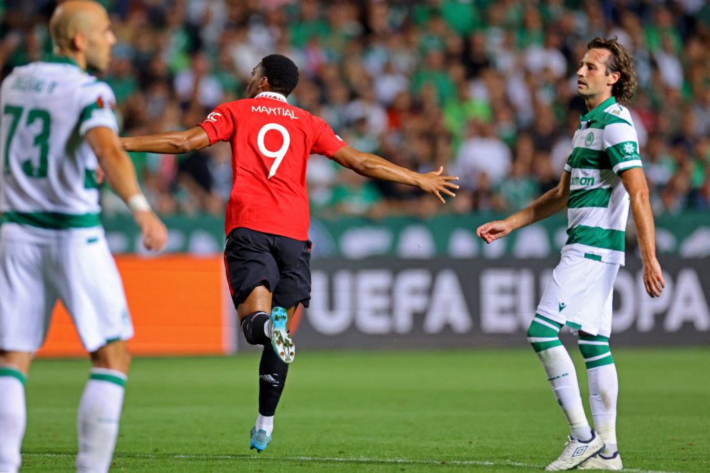 Manchester United's French striker Anthony Martial (C) celebrates after scoring a goal during the UEFA Europa League group E football match between...