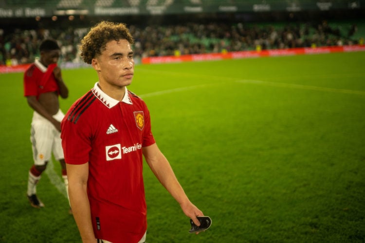 Sam Murray of Manchester United applauds the fans after the friendly match between Real Betis and Manchester United at Estadio Benito Villamarin on...