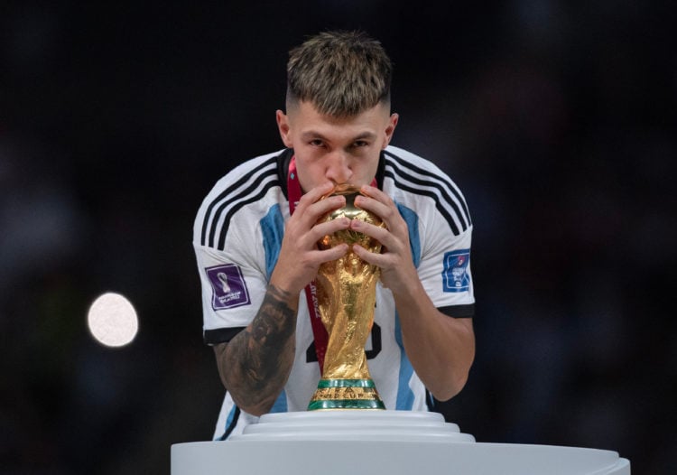 Lisandro Martinez of Argentina kisses the World Cup trophy after the FIFA World Cup Qatar 2022 Final match between Argentina and France at Lusail S...