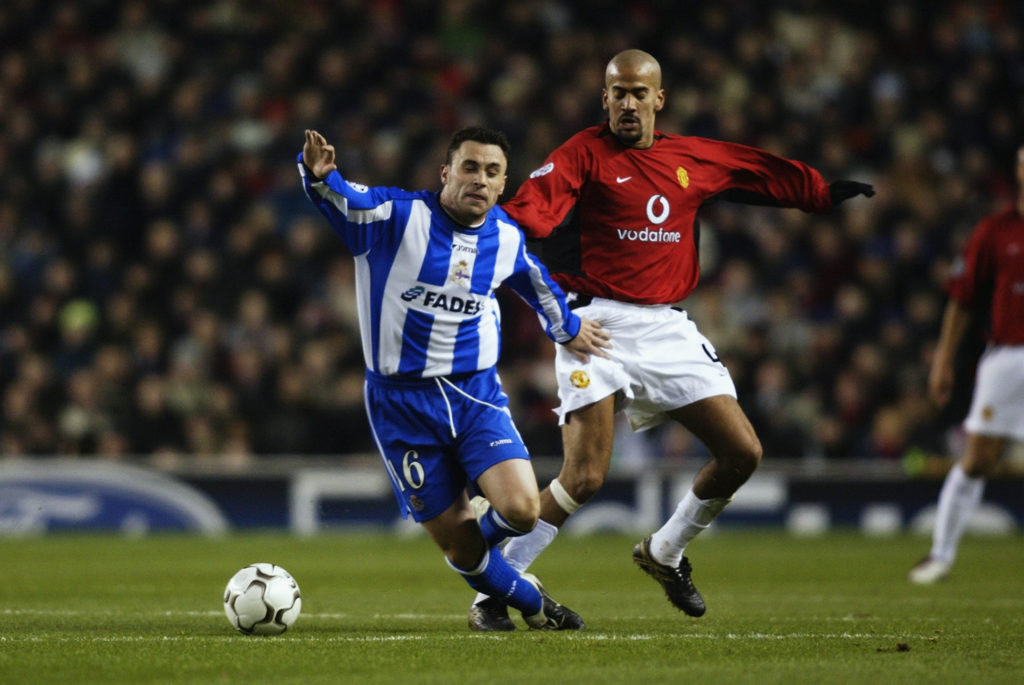 Juan Sebastian Veron of Manchester United trips Gonzalez Soriano Sergio of Deportivo la Coruna