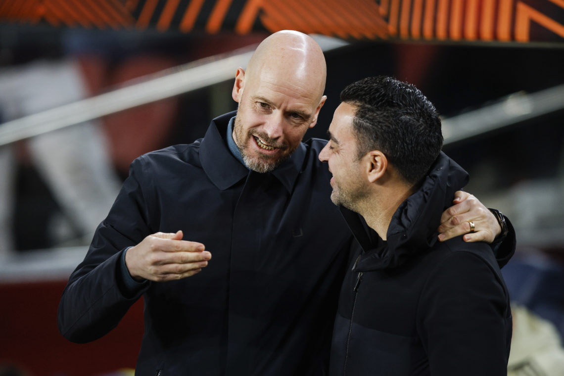 head coach Erik Ten Hag of Manchester United and head coach Xavi Hernandez of FC Barcelona talk to each other prior to the UEFA Europa League knock...