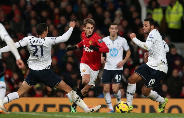 Adnan Januzaj of Manchester United in action with Vlad Chiriches and Mousa Dembele of Tottenham Hotspur during the Barclays Premier League match be...