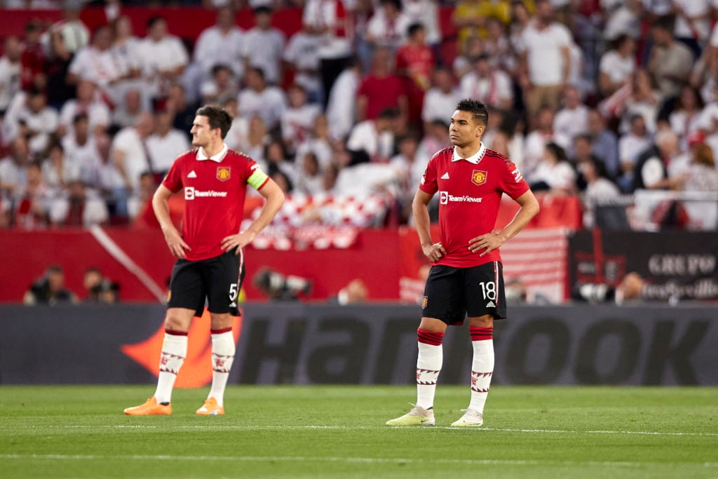 Harry Maguire and Casemiro of Manchester United react after Youssef En-Nesyri of Sevilla FC goal during the UEFA Europa League quarterfinal second ...