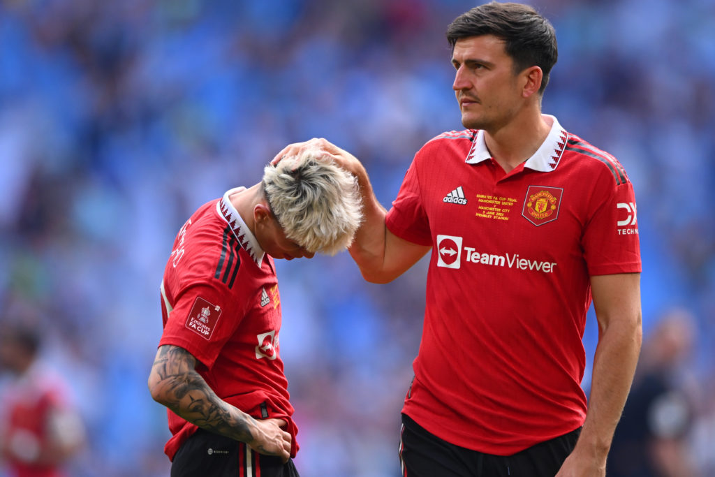 Alejandro Garnacho and Harry Maguire of Manchester United look dejected