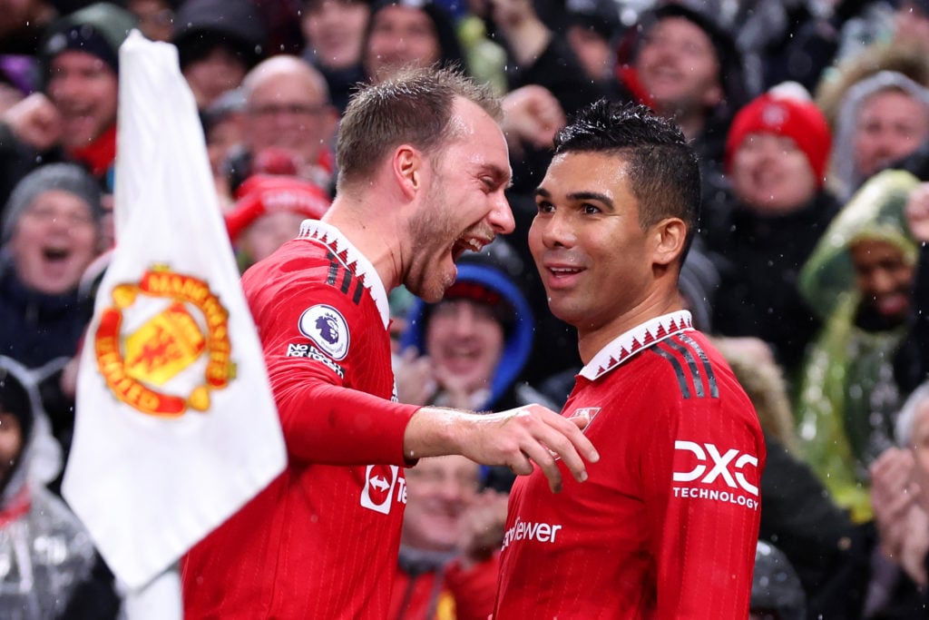 Casemiro of Manchester United celebrates after scoring the team's first goal with teammate Christian Eriksen during the Premier League match betwee...