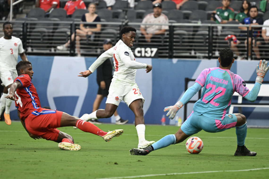 Jonathan David #20 of Canada scores on Orlando Mosquera #22 of Panama during the 2023 CONCACAF Nations League semifinals at Allegiant Stadium on Ju...
