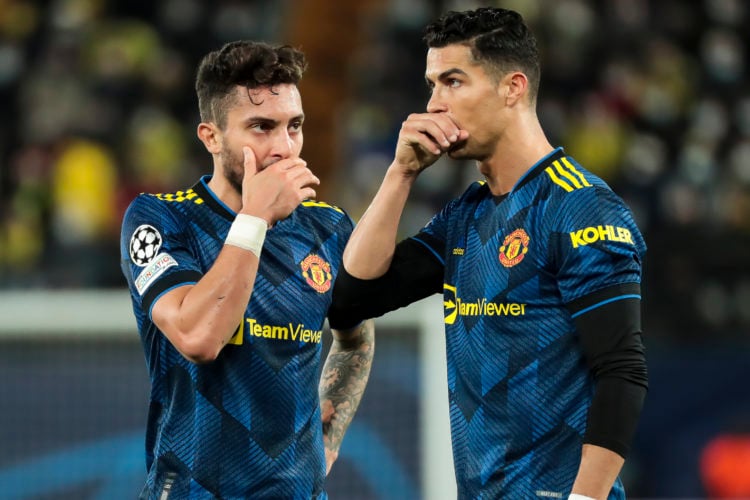 Defender of Manchester United Aleix Telles (L) and   Forward of Manchester United Cristiano Ronaldo    during     Champions League match between Vi...