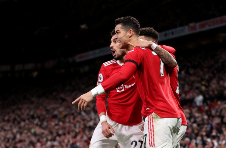 Cristiano Ronaldo of Manchester United celebrates after scoring their team's second goal during the Premier League match between Manchester United ...